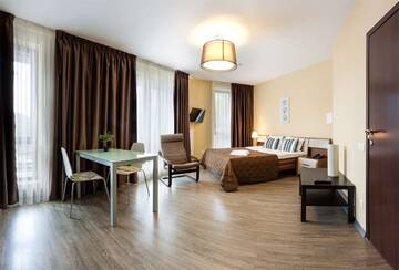 Фото номера Апартаменты-студио с видом на горы Гостевой дом SKYPARK ApartHotel г. Красная Поляна 2