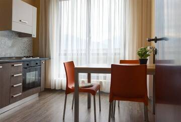 Фото номера Апартаменты Комфорт с видом на горы  Гостевой дом SKYPARK ApartHotel г. Красная Поляна 6
