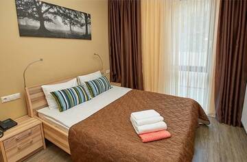 Фото номера Стандартный номер  Гостевой дом SKYPARK ApartHotel г. Красная Поляна 7