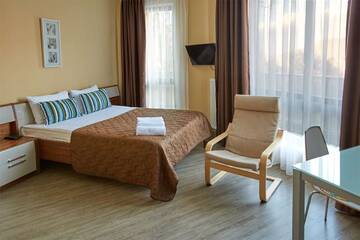 Фото номера Апартаменты-студио с видом на горы Гостевой дом SKYPARK ApartHotel г. Красная Поляна 4