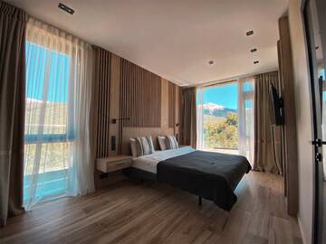 Фото номера Вилла на 7 спален  Гостевой дом SKYPARK ApartHotel г. Красная Поляна 9
