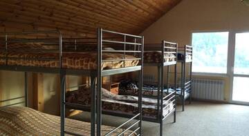Фото номера Спальное место на двухъярусной кровати в общем номере 13-местном номере Хостел Красная Поляна г. Красная Поляна 5