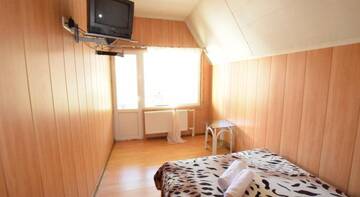 Фото номера Семейный номер с террасой Гостиница Green House Na Turchinskogo г. Красная Поляна 7