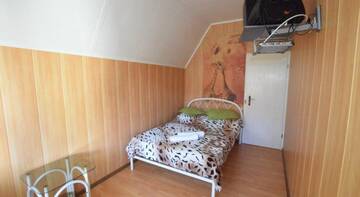 Фото номера Семейный номер с террасой Гостиница Green House Na Turchinskogo г. Красная Поляна 3