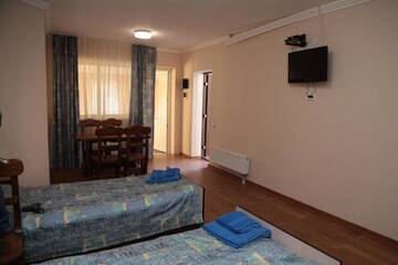 Фото номера Стандартный семейный номер Гостевой дом Kastana Hotel г. Красная Поляна 5